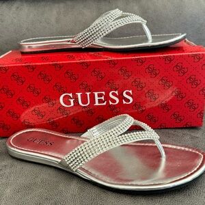 Guess women’s flip flops. Great condition. Authentic. Size 8M.